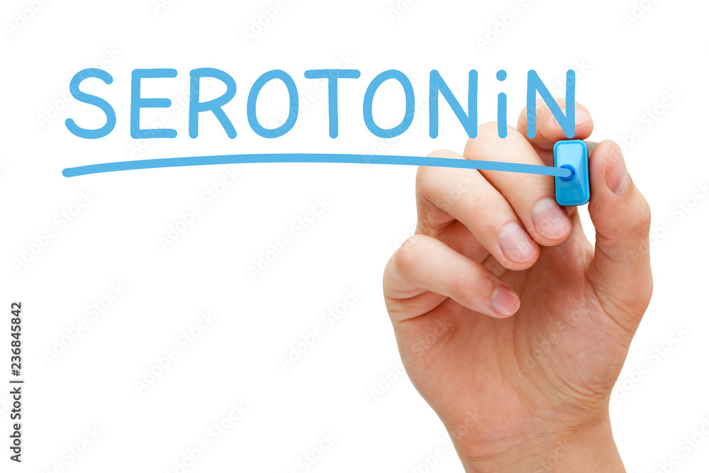Hand Writing Serotonin With Blue Marker Hand Writing Serotonin With Blue Marker