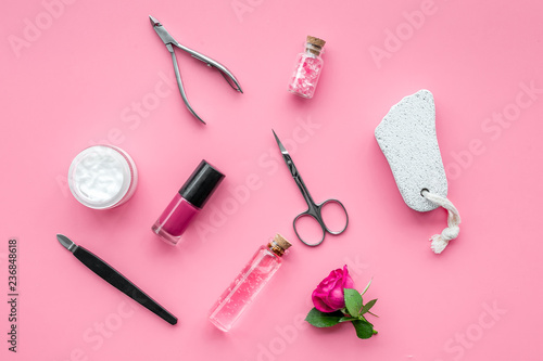 Fototapeta Naklejka Na Ścianę i Meble -  manicure tools set for nail care on rose background top view
