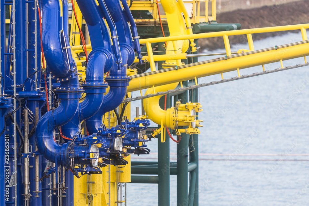 Cargo manifolds of the oil terminal in a sea port. Cargo manifolds of the oil terminal in a sea port.