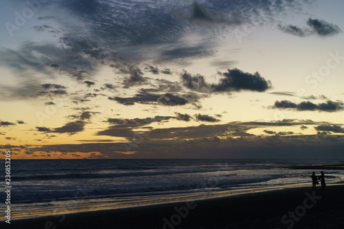 The surf of Atlantic ocean in the Grand Canaria island at the blue sunset