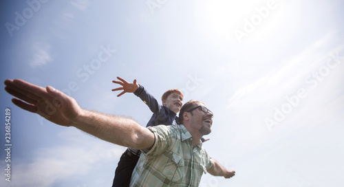 happy father and son have fun together