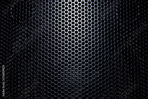 Black background protective grille with light.