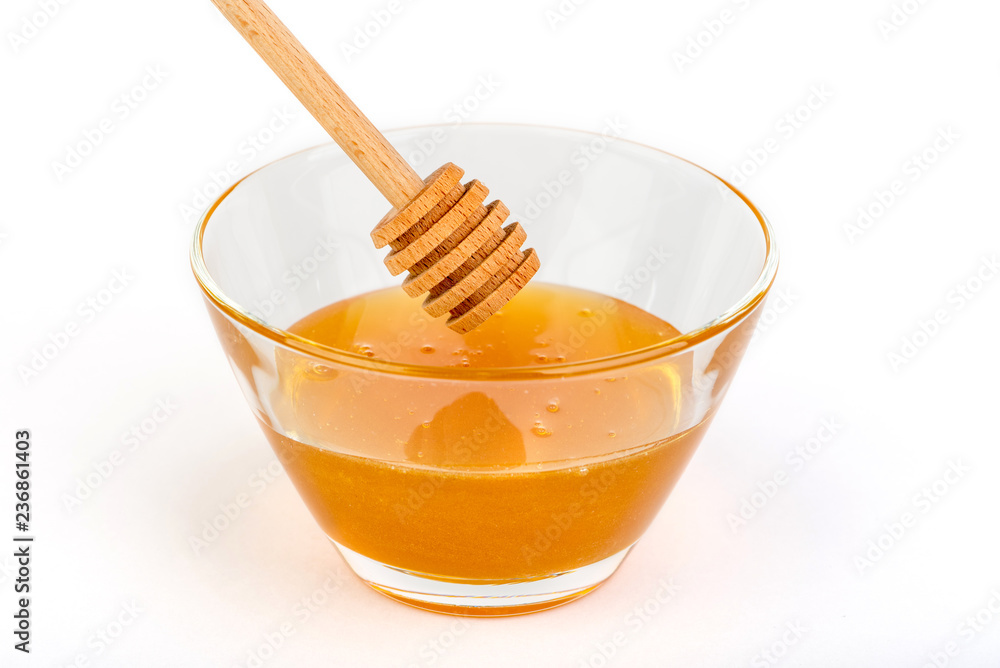 honey in jar isolated on white background honey in jar isolated on white background