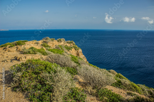 sea shore line nature scenery environment from high cape mountain top point above vivid blue water surface