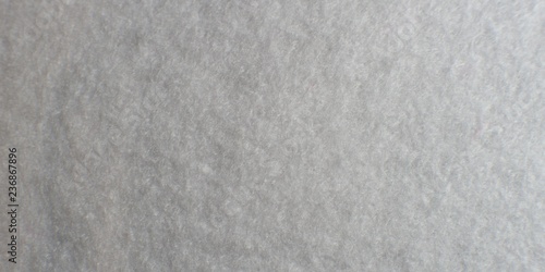 White artificial foam, foam texture on a light background.