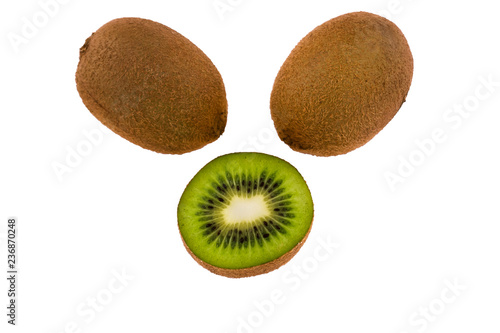 Half and whole kiwi fruit. Ripe fruit. Isolated on white background.