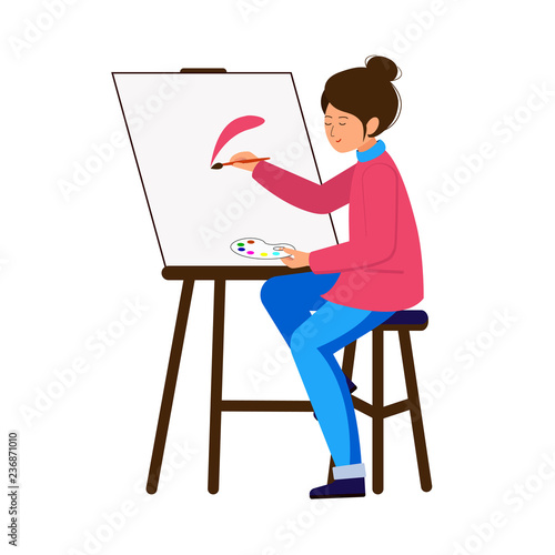 The artist paints a picture, holding a brush and palette. The girl sits on a stool at the easel and paints. A young woman in the open air engaged in fine arts.