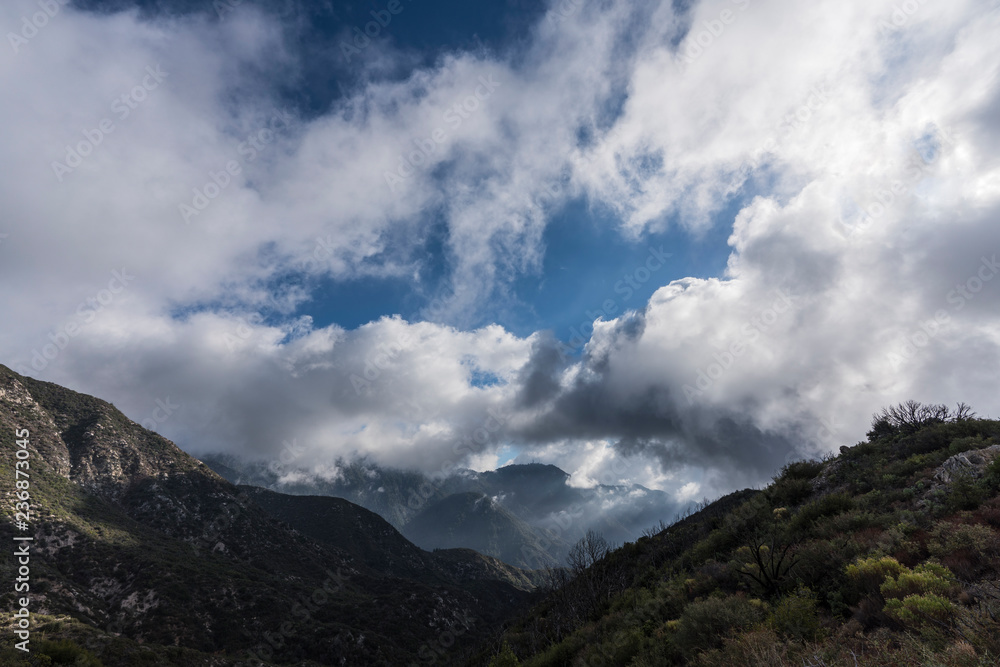 Dramatic December storm clouds over Mt Harvard and the San Gabriel Mountains in the Angeles National Forest above Pasadena and Los Angeles, California.  