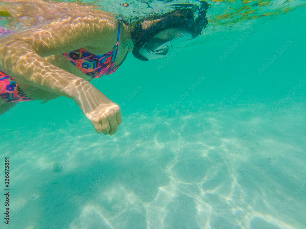 Teenage girl does snorkeling