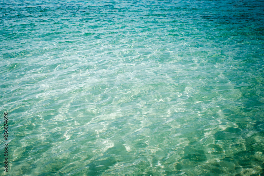 light blue green water background, dream of tropical beach