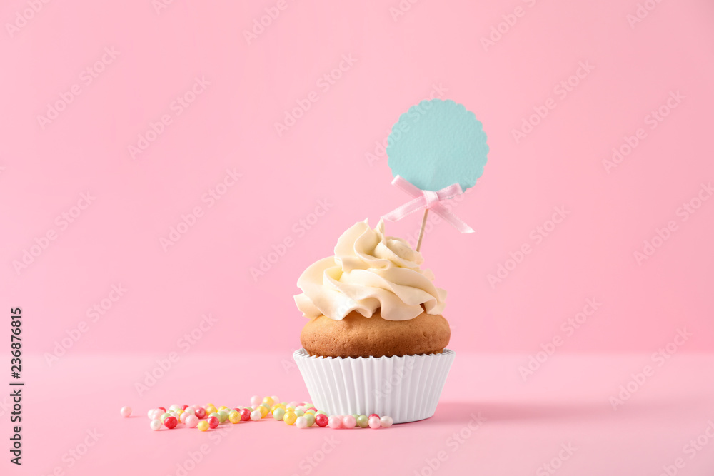 Delicious birthday cupcake on color background Delicious birthday cupcake on color background