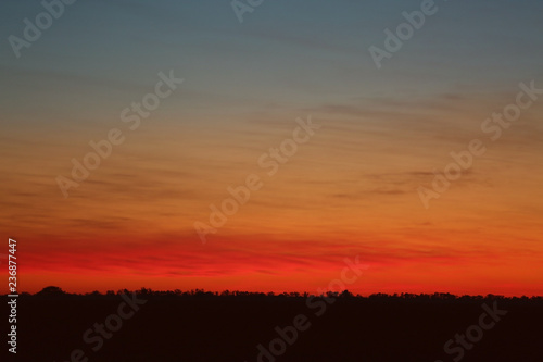 Picturesque view of beautiful sky lit by setting sun