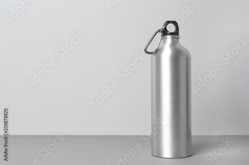Sport bottle with space for text on light background