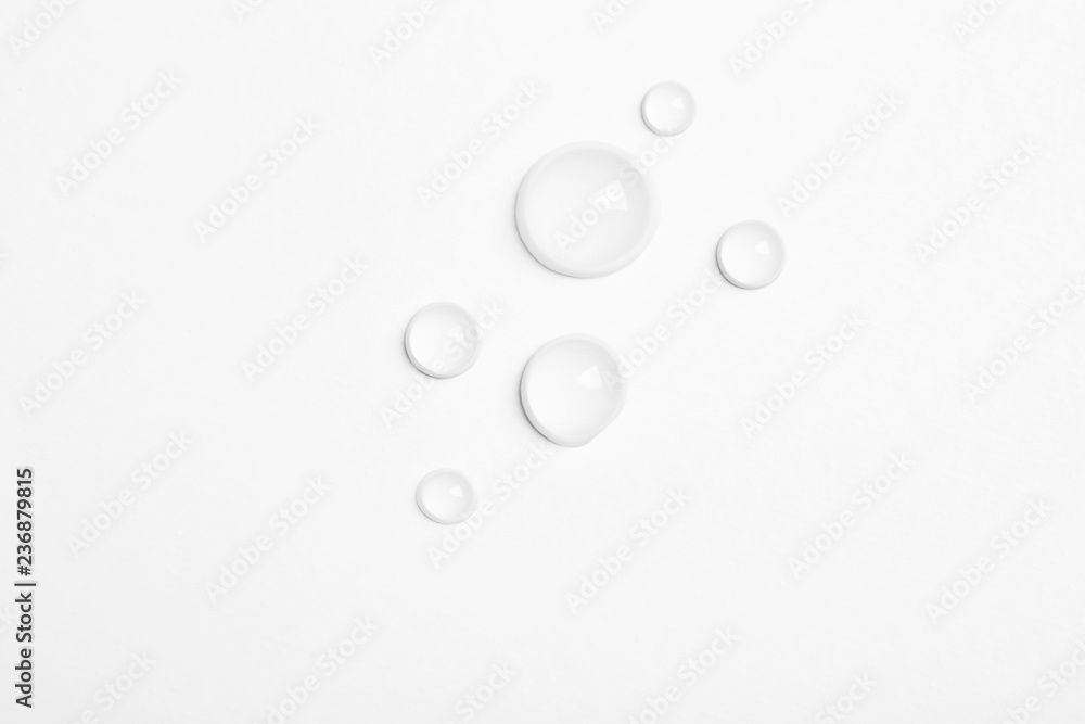 Water drops on white background, top view - obrazy, fototapety, plakaty 