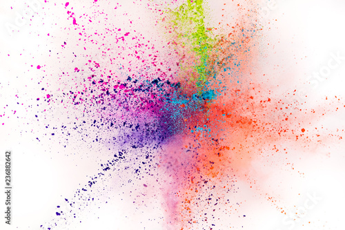 Colored powder explosion on white background.