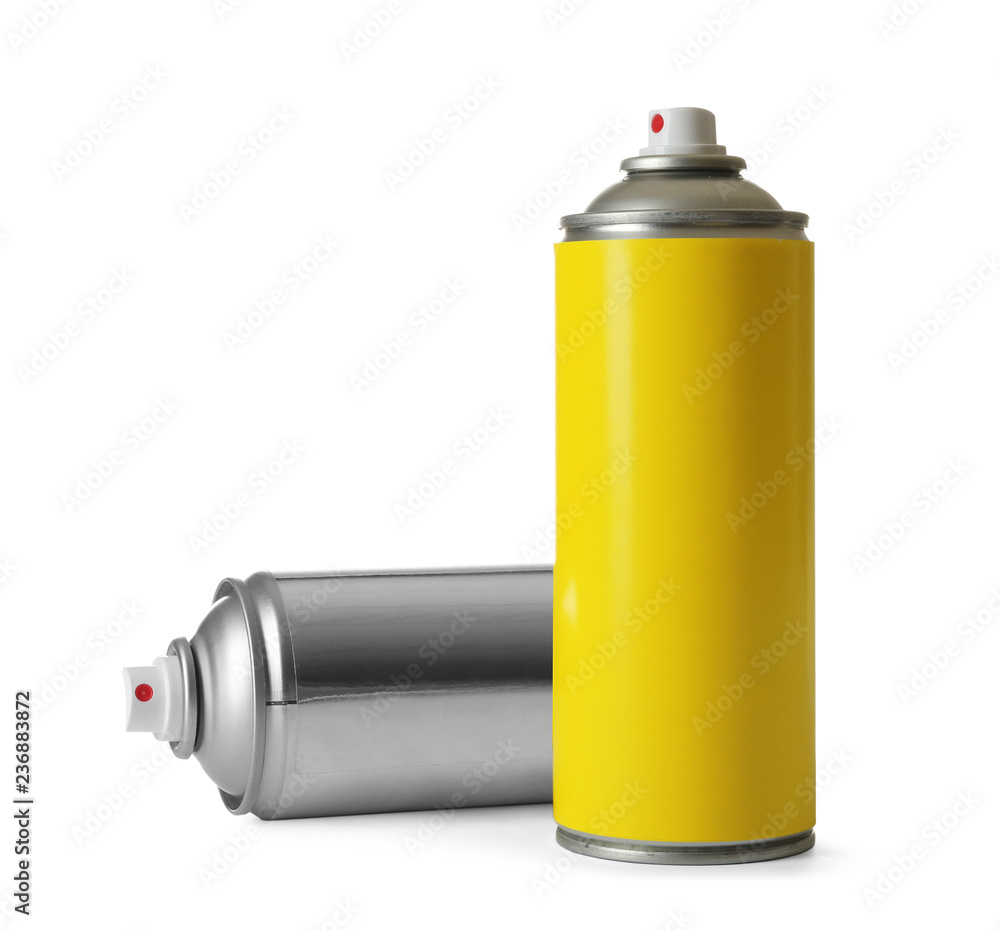 Cans of different spray paints on white background Cans of different spray paints on white background