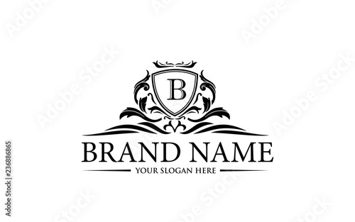 Luxury logo template vector golden vintage flourishes ornament. logo design inspiration