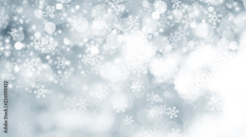 white snow blur abstract background. Bokeh Christmas blurred beautiful shiny Christmas lights. white and gray winter backdrop.
