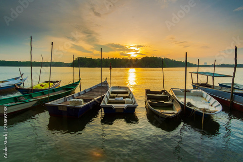sunrise scenery at lumut,malaysia.soft focus,blur due to long exposure. visible noise due to high ISO. © airell