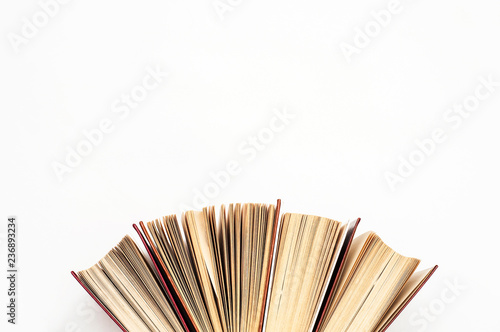 Open books with pages on a white background