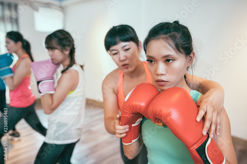 group of asian people taking boxing lesson © PR Image Factory