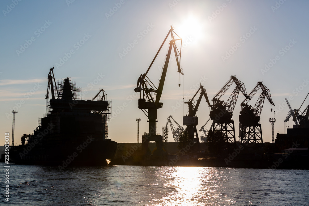 Silhouette shipyard have crane machine, Shipyard industry.