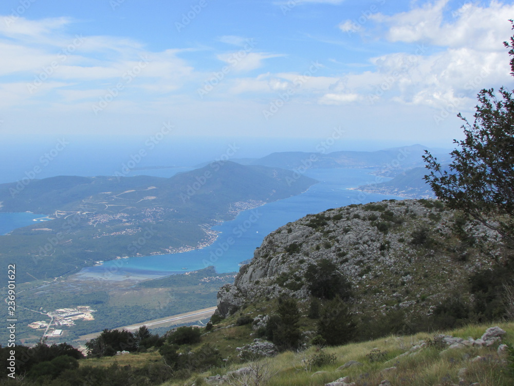 Aerial view to the Bay of Kotor from Lovcen national park under cloudly sky, Montenegro