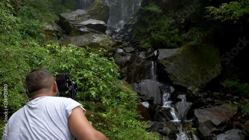 Indian Guy Taking a Photograph of the Hiryu Falls in Hakone, Kanagawa Pref., Japan (zoom in) photo