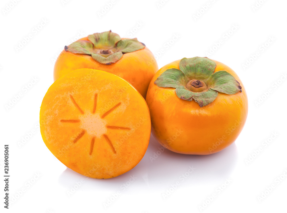 Tropical fruit persimmon. Kaki with leaves on white background. Tropical fruit persimmon. Kaki with leaves on white background.