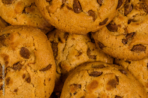 Pile of the fresh chocolate chip cookies for background