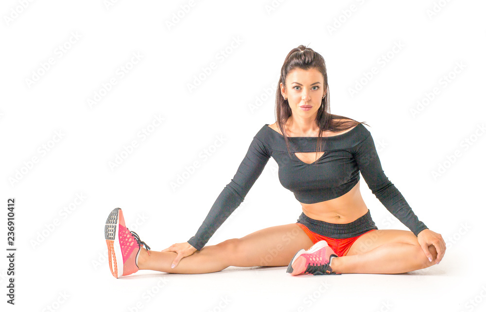 A Fitness woman stretching full body over white background A Fitness woman stretching full body over white background