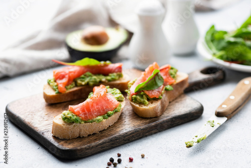 Salmon toast with avocado. Healthy snack or appetizer