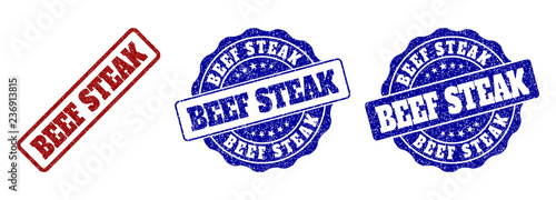 BEEF STEAK grunge stamp seals in red and blue colors. Vector BEEF STEAK imprints with grunge surface. Graphic elements are rounded rectangles, rosettes, circles and text labels.