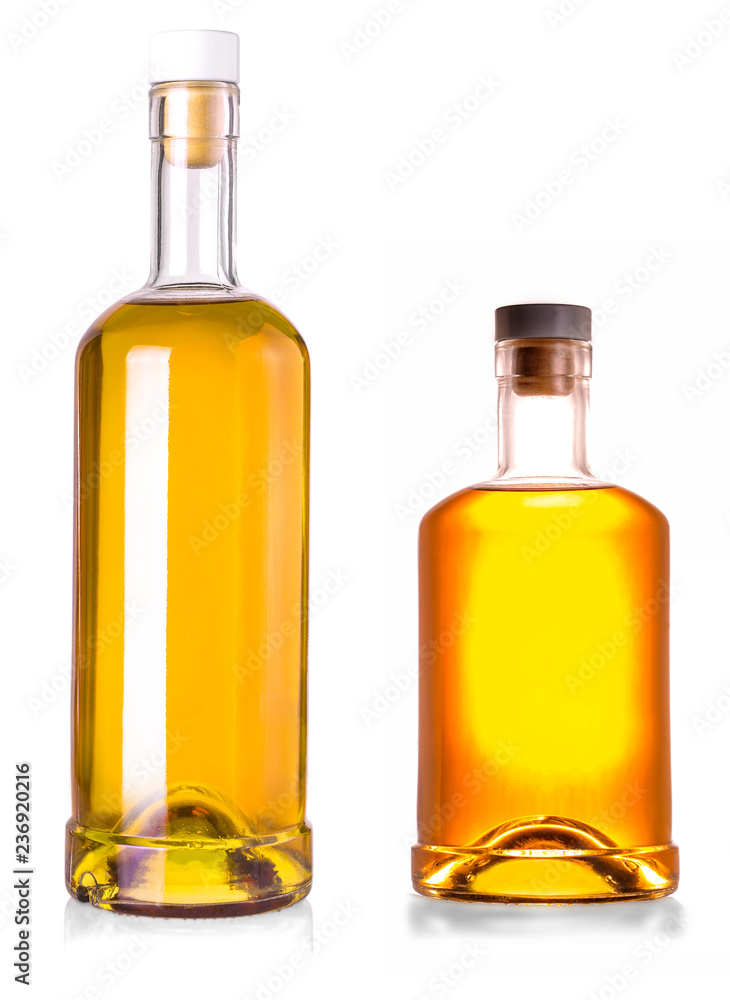 Two Full whiskey bottles isolated on white background