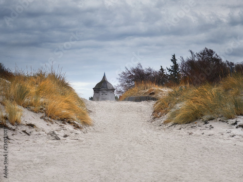 Fototapeta Naklejka Na Ścianę i Meble -  Old windmill in Vitte village on island of Hiddensee, off the Baltic coast of Germany, copy-space