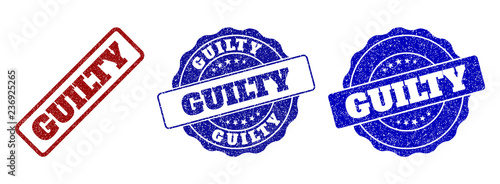 Foto GUILTY grunge stamp seals in red and blue colors
