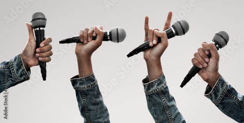 Set of hand holding microphone