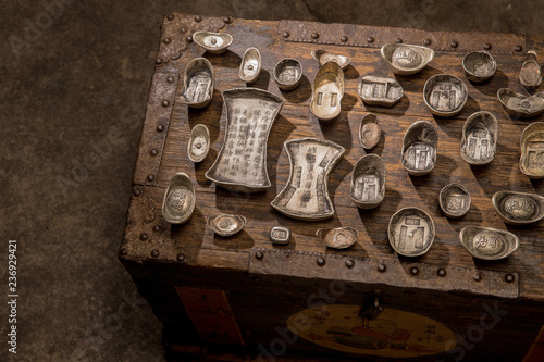 Gold ingot and silver treasure