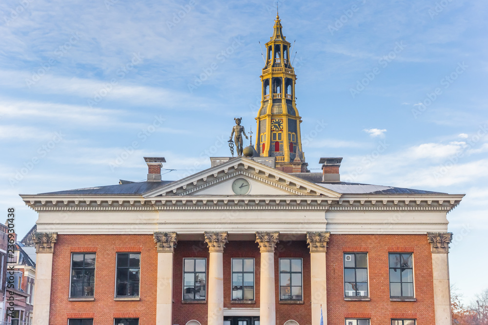 Obraz premium Former grain exchange building and church tower in Groningen, Netherlands