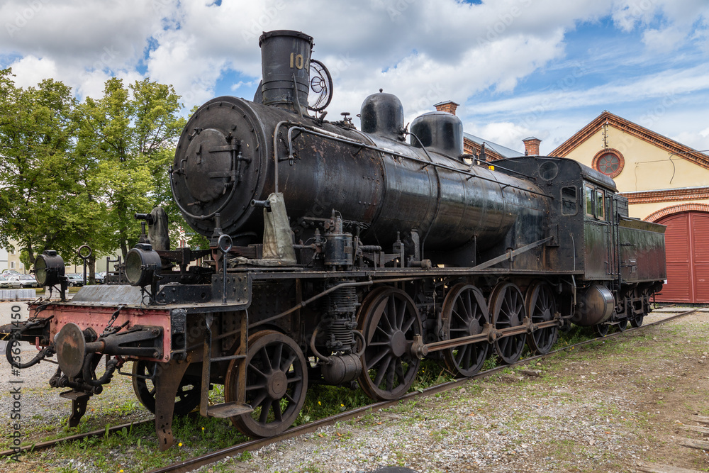 Fototapeta premium Hundred year old black steam locomotive