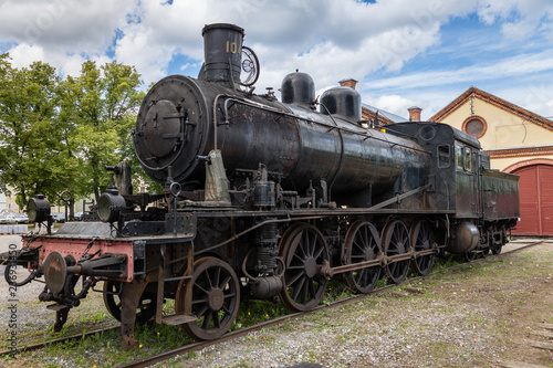 Hundred year old black steam locomotive