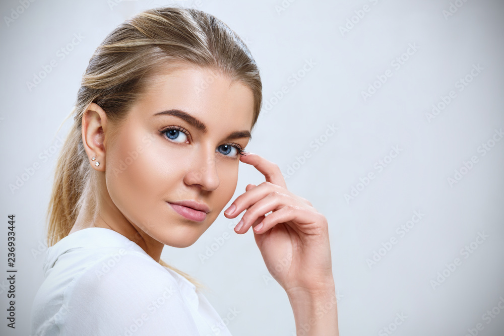 Attractive caucasian smiling woman with blond hair. Attractive caucasian smiling woman with blond hair.