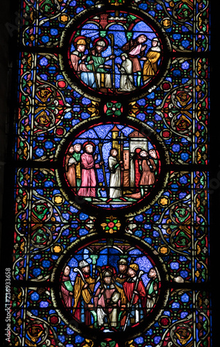  Colorful stained glass windows in Troyes Cathedral dedicated to Saint Peter and Saint Paul. France.