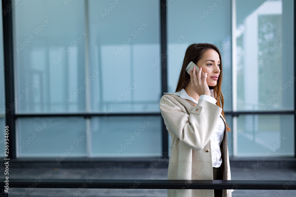 Portrait of young businesswoman going to office