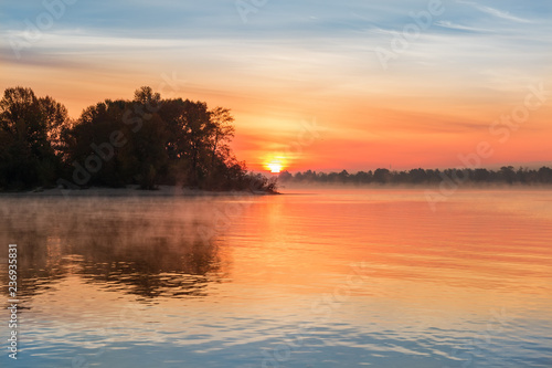 Sunrise over the plain river at autumn © An-T
