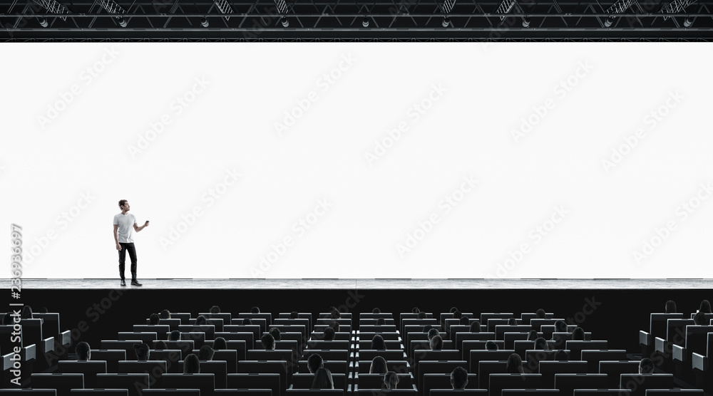 Presentation hall with person on scene auditorium blank screen mockup Presentation hall with person on scene auditorium blank screen mockup