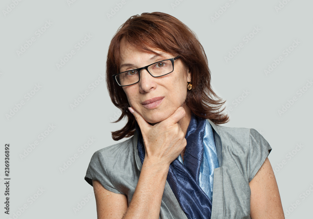 Thinking business woman in glasses on white background Thinking business woman in glasses on white background