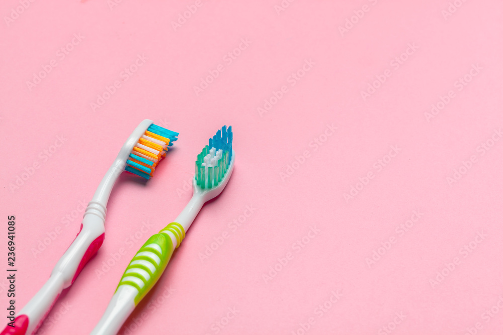 Toothbrushes on pink background Toothbrushes on pink background