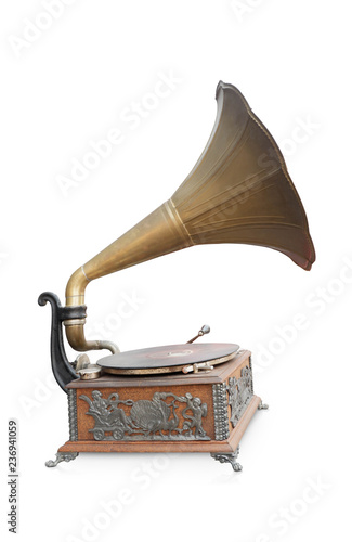 side view antique brass and wooden gramaphone on white background,copy space