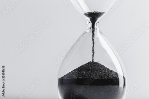Close up hourglass on table
